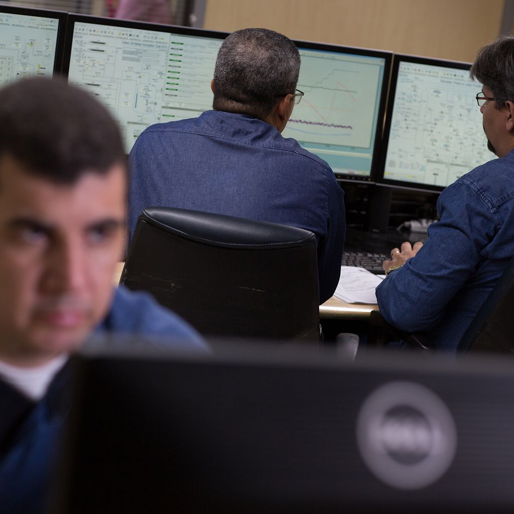 Men in Control Room