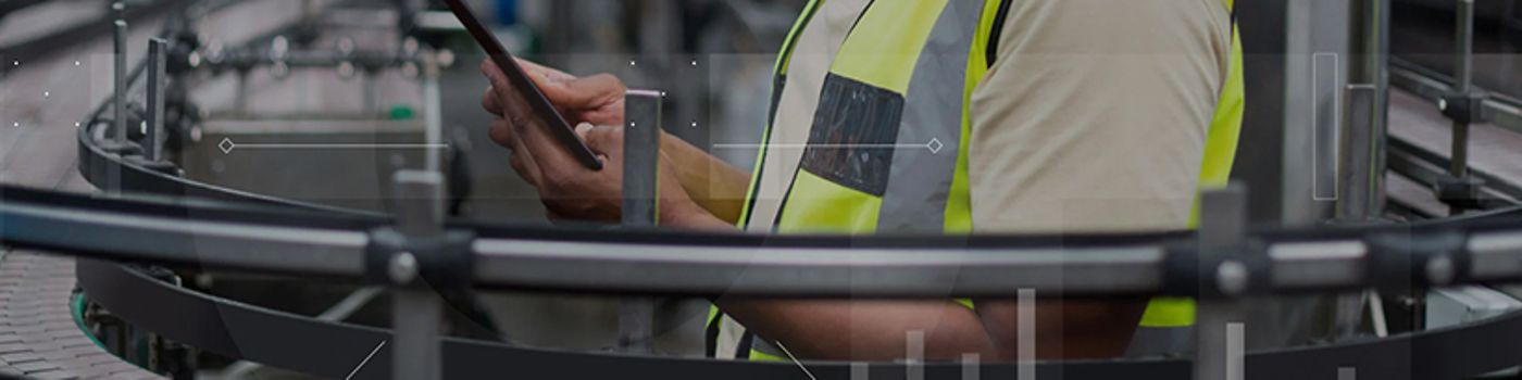 Factory worker on tablet